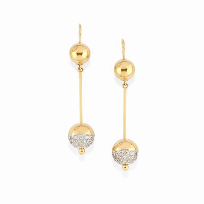 Orecchini in oro giallo 18K con pietre incolore