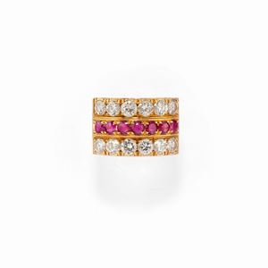 A 18k red gold, ruby and diamond ring