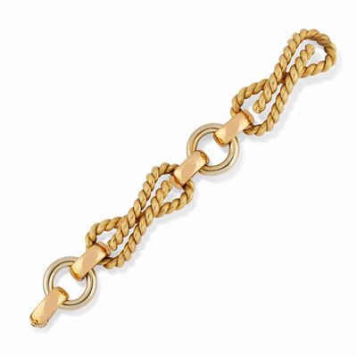 Bracciale in tre ori 18K con maglie ovali e motivi circolari