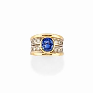 A 18K tow color gold, sapphire and diamond ring 