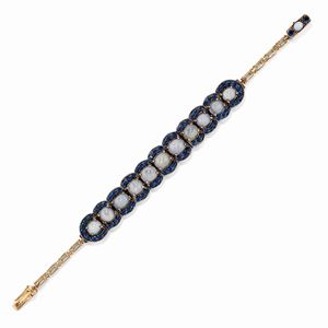 A 9K yellow gold and silver bracelet with sapphires