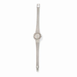 A 18K white gold and diamond wristwatch, Omega
