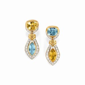 A 18K yellow gold, diamonds, blue topaz and citrine quartz pair of earrings