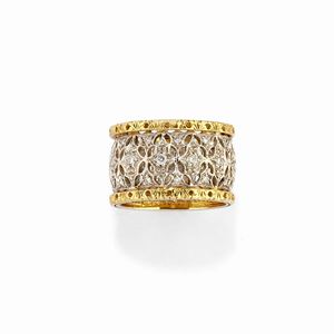 A 18K two color gold and diamonds ring
