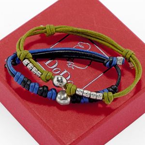 Lotto di due bracciali in argento, dodo di pomellato