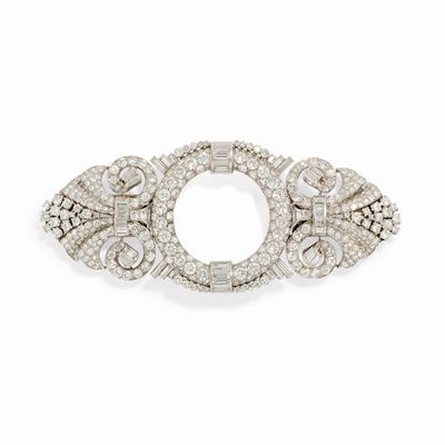 Gioiello scomponibile in platino, oro bianco 18K e diamanti, circa 1940