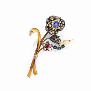 A 18k yellow gold, silver, sapphire, ruby, pearl and diamond brooch