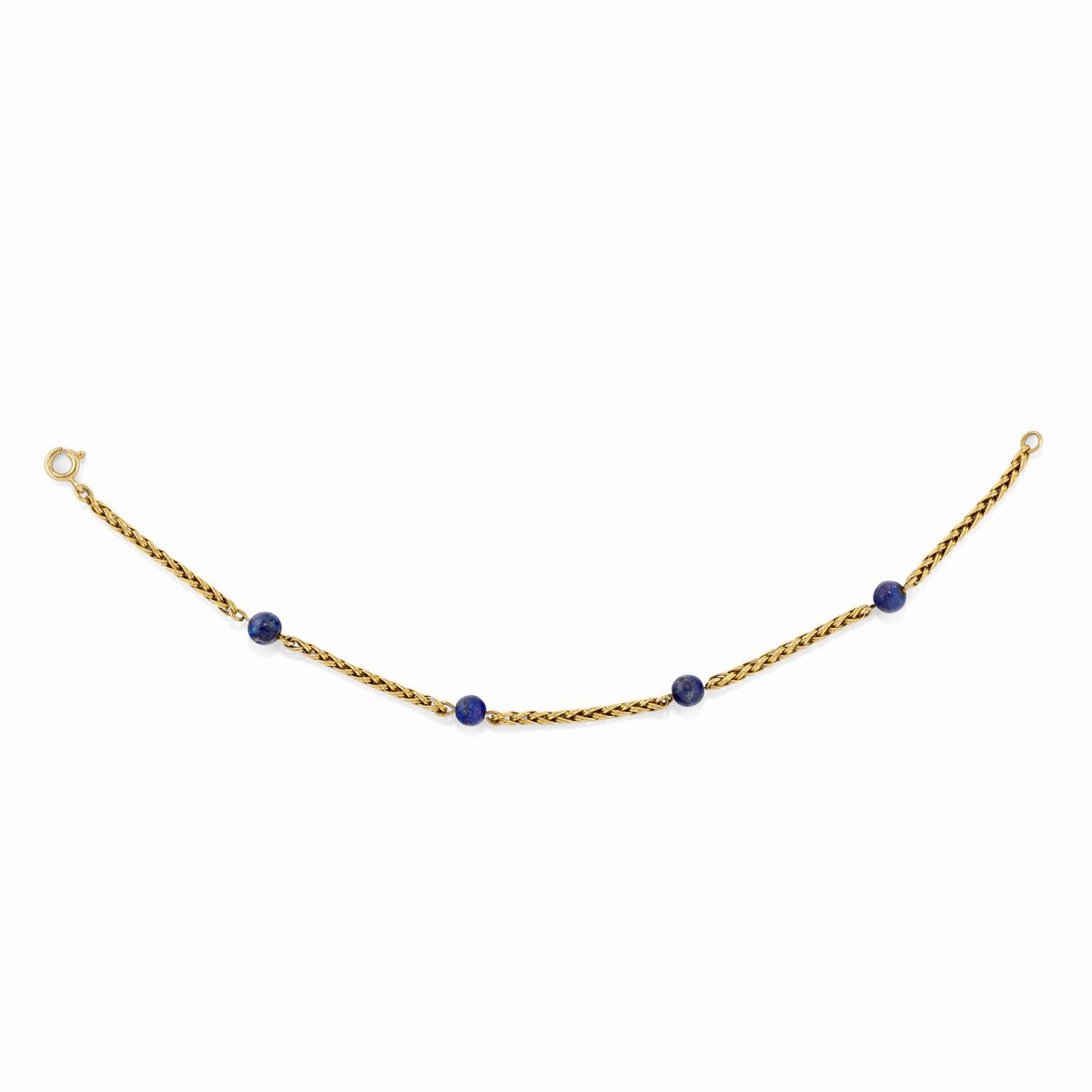 Tre bracciali e un pendente in oro giallo 18K con pietre dure, smalto e perle