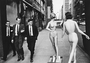 Men walking past mannequins, Madison Avenue, New York City