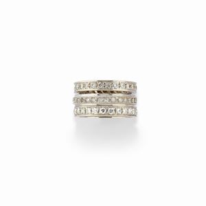  - Tre anelli eternity in oro bianco 18K, diamanti e pietre sintetiche
