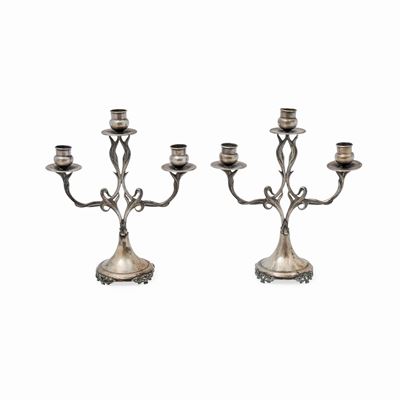 Coppia di candelabri in argento, Italia, XX secolo, a tre fiamme