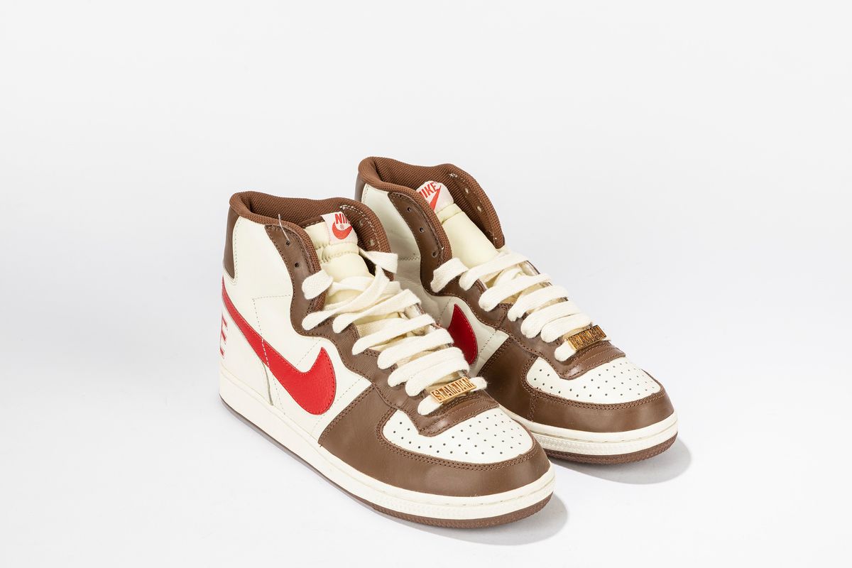 brown and red nikes