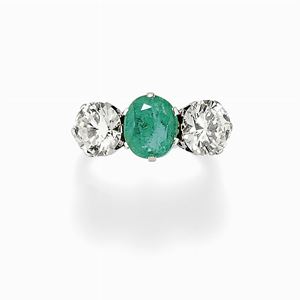 A 18K white gold, emerald and diamond ring