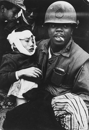 Marine with wounded child