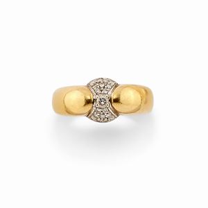 A 18k two-color gold and diamond ring