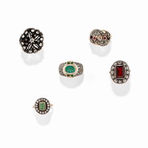 A low-carat gold, silver, emerald, diamond, ruby and colored gemstone five rings