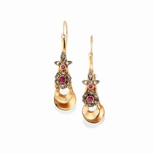 A 14k gold, silver, ruby and diamond earrings