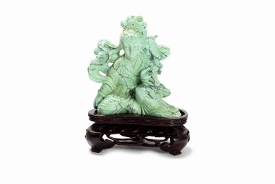 Piccola Figura Femminile in Turchese con Leone Shishi, Cina Prima Metà del Secolo XX
