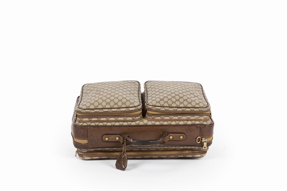 Gucci - Valigia con logo GG, tessuto monogrammato e pelle di cinghiale