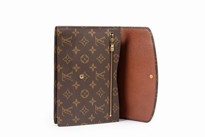 Borsa pochette in tela monogram con interno in pelle