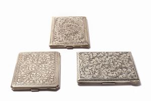 Lot consisting of three silver cigarette cases with floral pattern, first half of the 20th century