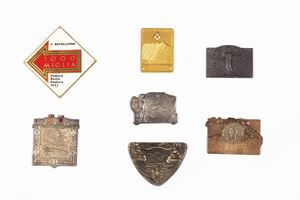 Lot consisting of seven metal and enamel plaques