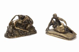 Two bronze sculptures depicting erotic scenes
