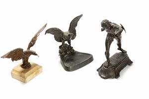 Lotto composto da tre porta orologi in metallo, inizi secolo XX