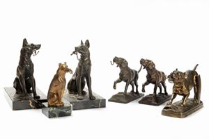  - Lotto composto da sei porta orologi a forma di cani, inizi secolo XX
