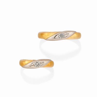 Due Fedi in Oro Giallo 18k, Platino e Diamanti