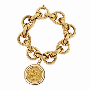 A 18K yellow gold and coin bracelet