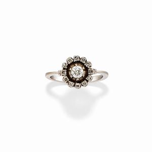  - A 18k white gold and diamond ring