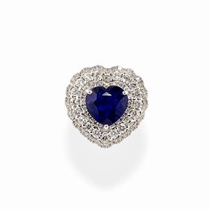 A 18k white gold, sapphire and diamond ring, with box