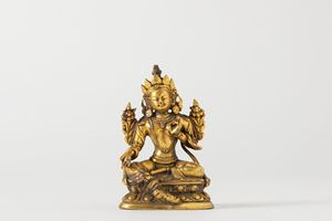 A small gilt bronze Green Tara. Tibet, 19th century