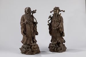 A pair of bronze figures of Shoulao . China, late Qing dynasty / Republic Pediod (1912-1949)