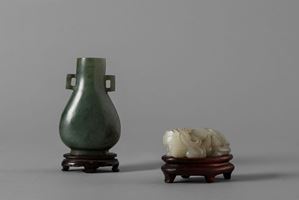 A white jade Qilin and an hardstone two-handled small vase. China, 19th century