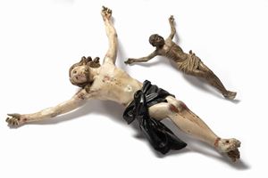Lot consisting of two ancient crucifixes in polychrome lacquered wood