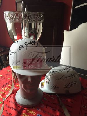 Lot of two autographed pilot helmets: