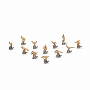 Twelve vermeil silver placeholders, Italy, 20th century, with box