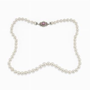 A 18K white gold, ruby and cultured pearl necklace
