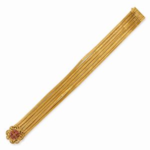  - Bracciale in oro giallo 18k e rubini