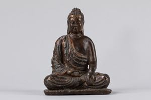  - A seated bronze Buddha. South East Asia, 19th century