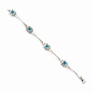 A 18k white gold, blue topaz and diamond bracelet