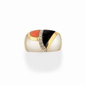 A 18k yellow gold, mother-of-pearl, coral, onyx and diamond ring