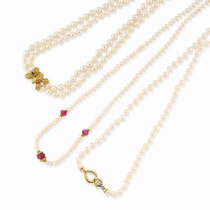 A 18k two-color gold, ruby and cultured pearl three necklaces