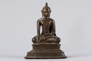 Scultura in bronzo raffigurante Buddha assiso. Sud est Asia, secolo XIX