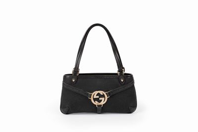 Mini borsa in tela nera con manici in pelle