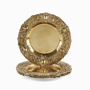 Quattro piatti in argento vermeil, europa xx secolo