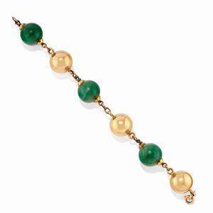 A 18k yellow gold and green gemstone bracelet
