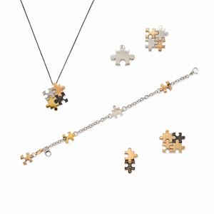 A 18k three color gold, black and uncolored diamond six jewels